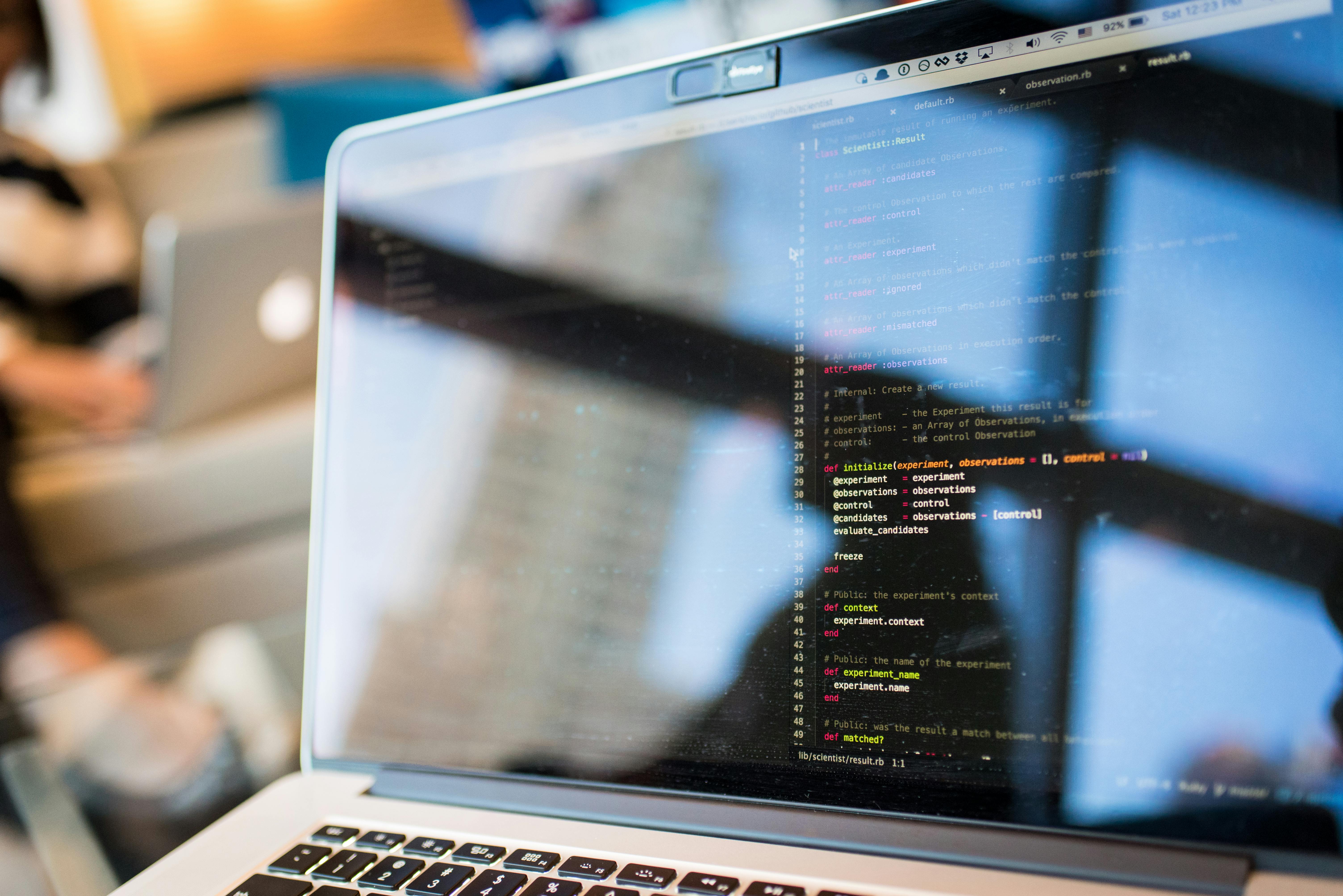 Programming code on laptop screen